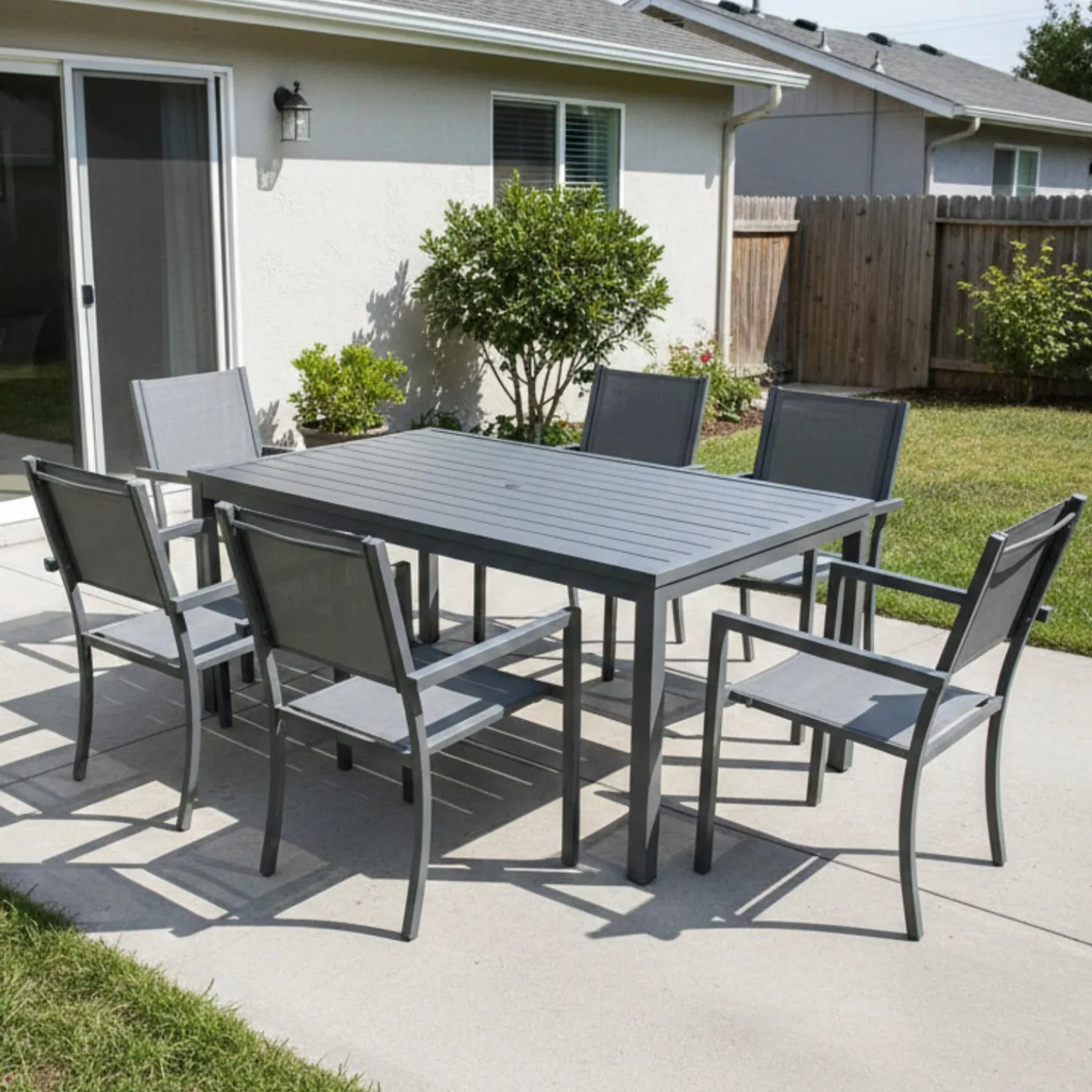 Table à manger rectangulaire d’extérieur en métal et 6 chaises